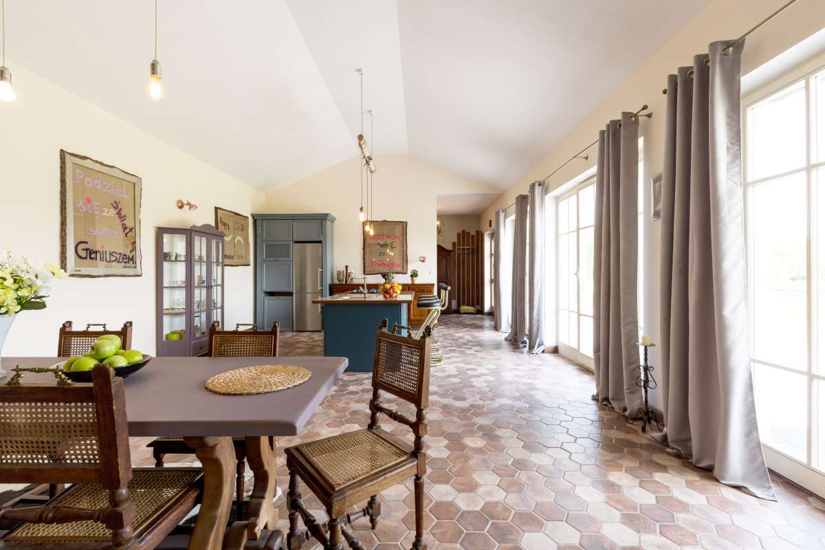 Spacious stylish interior with open dining room and kitchen of modern house